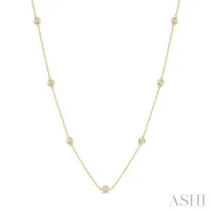 1/10 ctw Round Cut Diamond Station Necklace in 10K Yellow Gold