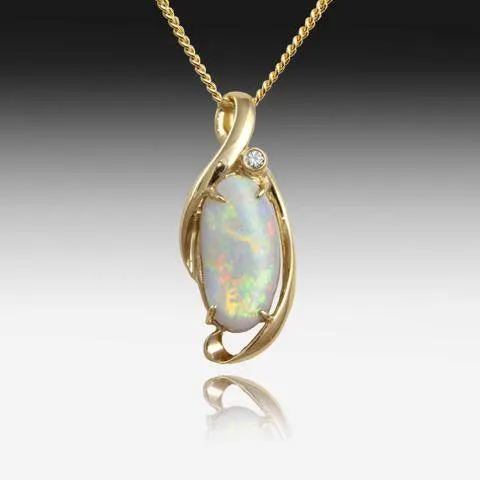 14kt Yellow Gold Crystal Opal and Diamond pendant