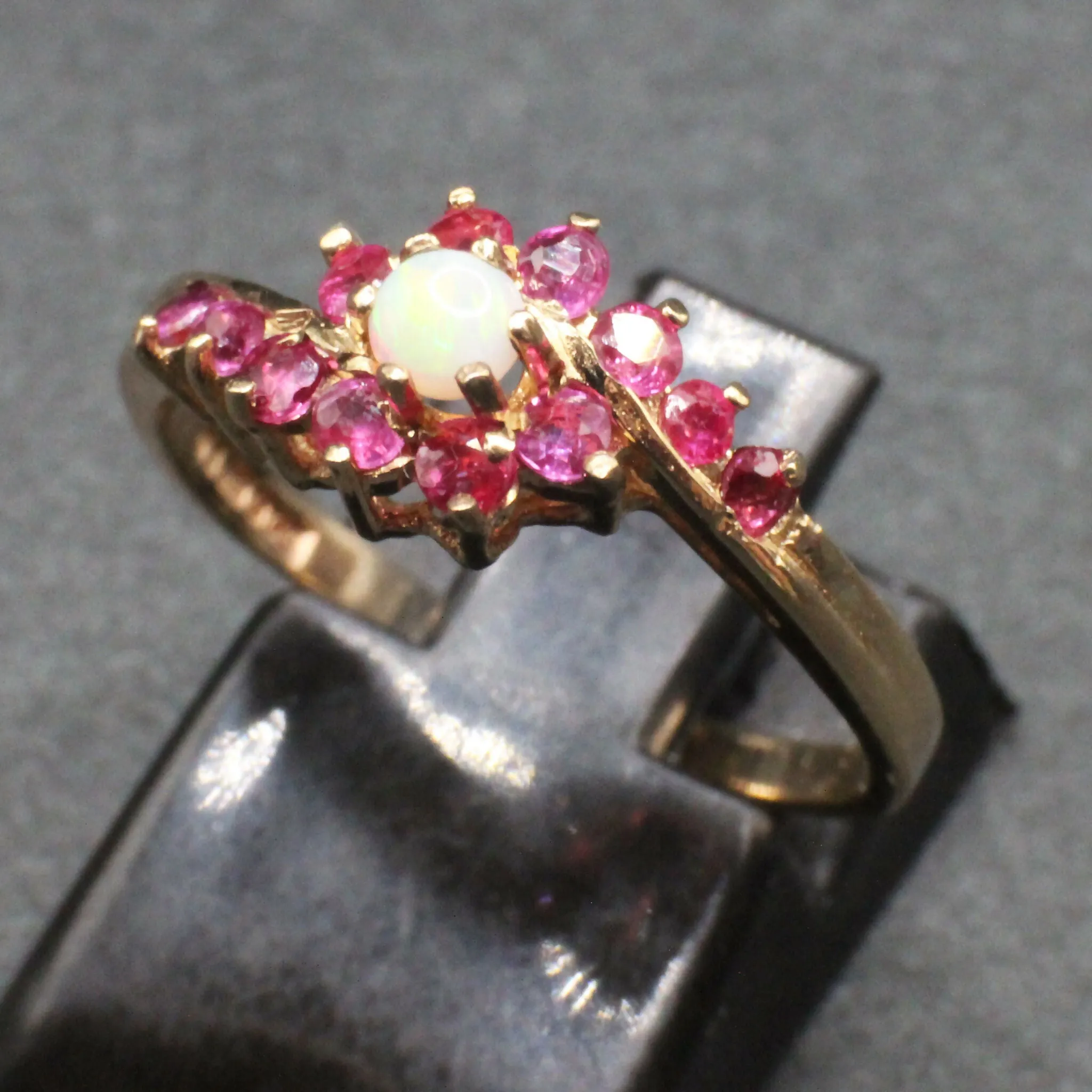 9ct gold opal / pink spinel crossover ring