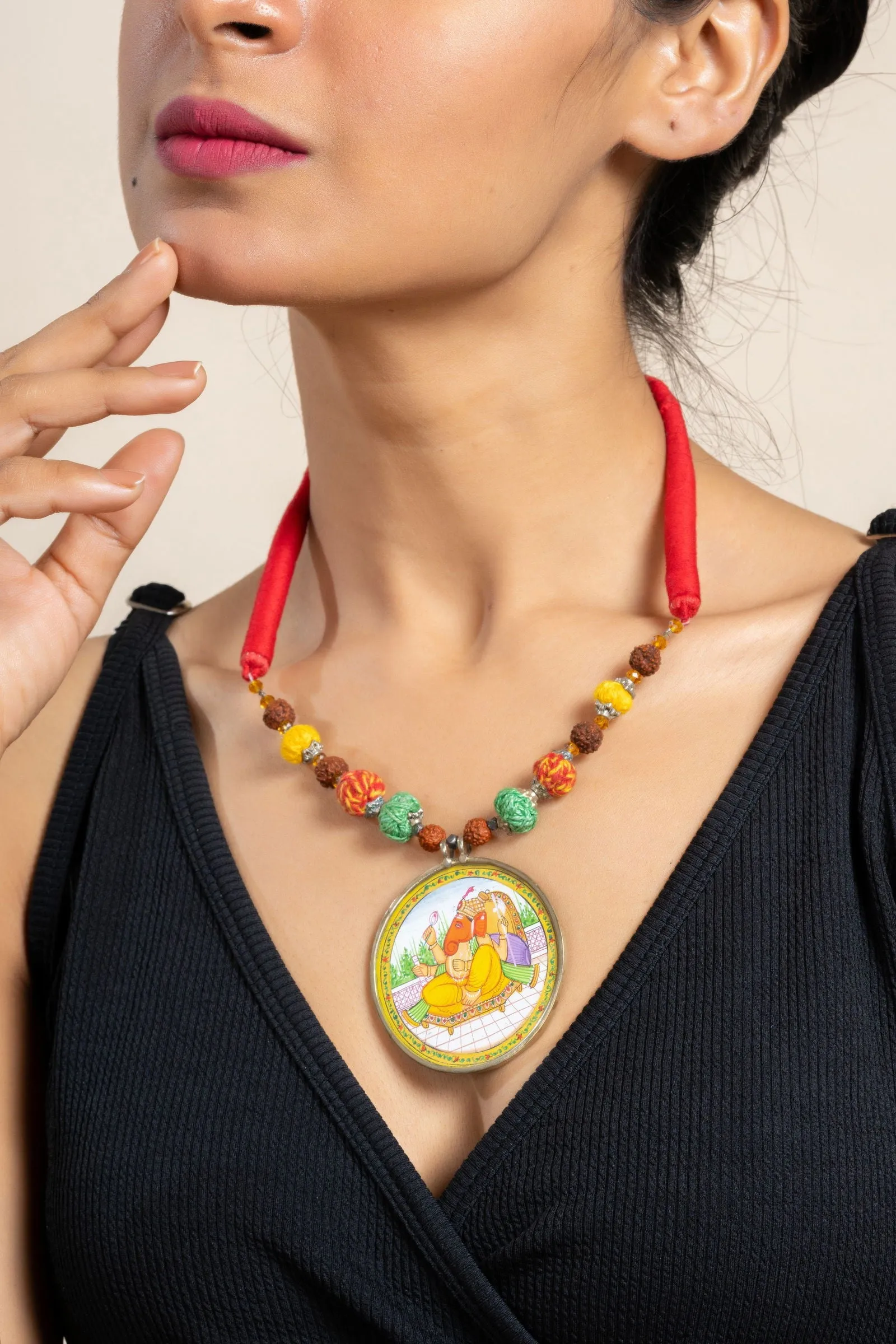 Handmade Yellow Miniature Handpainted Ganesha Pendant with Red Green Yellow Cotton Beads Necklace