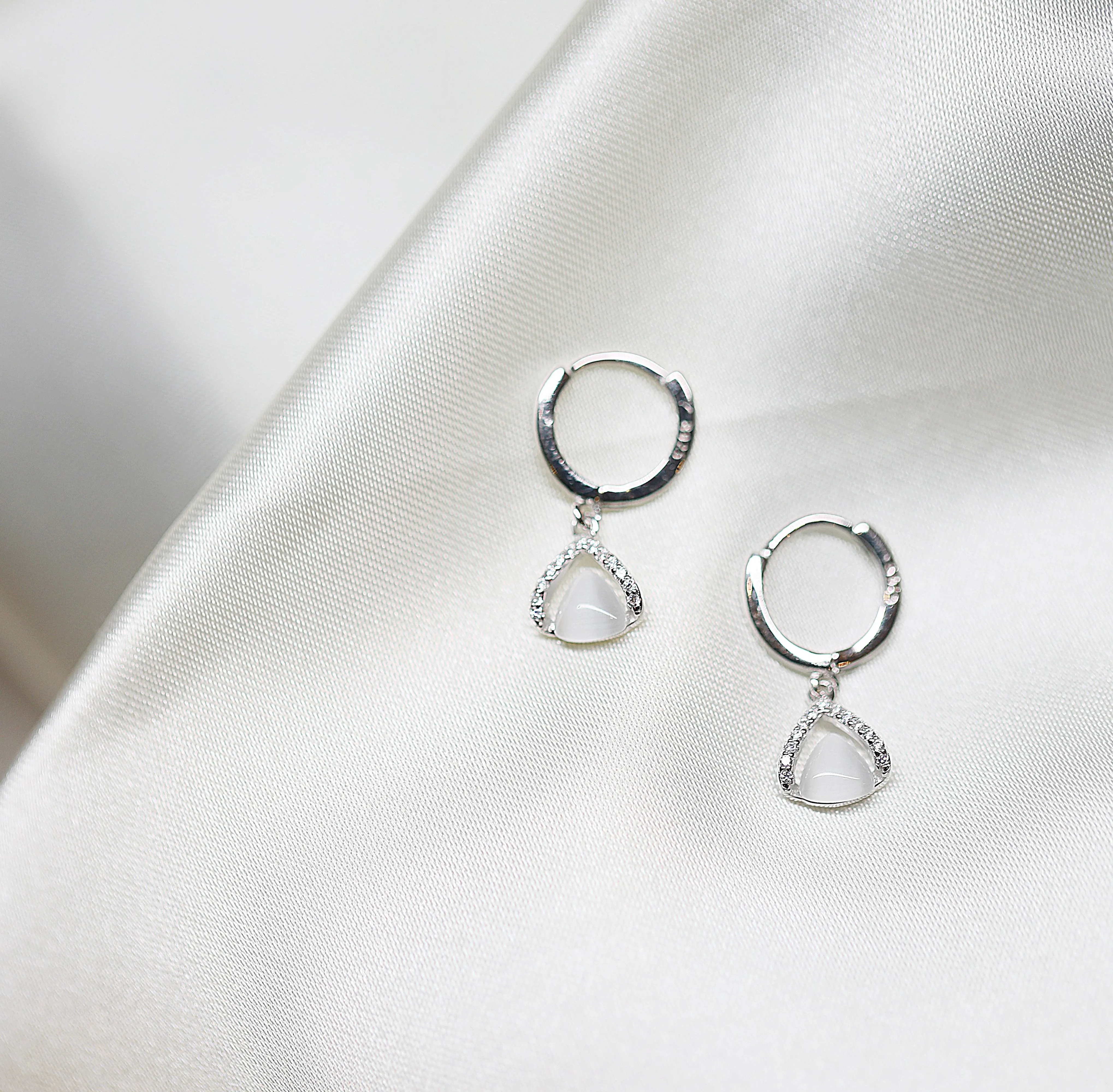 Tiny triangular silver hoop earrings